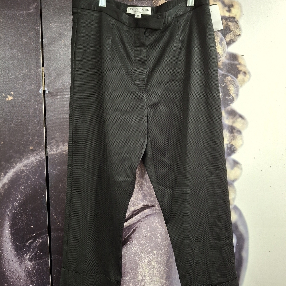 Trina Turk black satin towers, size 8, fushia color lining, wide  legs